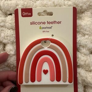 Pearhead Rainbow Silicone Teether in Red and Cream